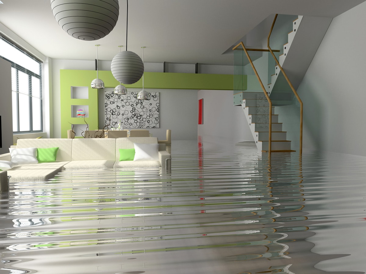 Living room with a couch experiencing massive flooding